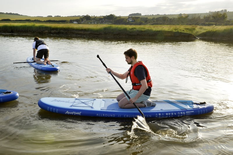 Paddleboarding at Cuckmere Haven (Photo by Jon Rigby) SUS-210616-082805001