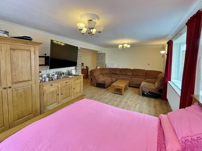 One of the six bedrooms