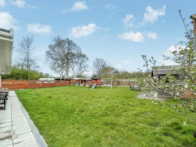 The garden has many outbuildings