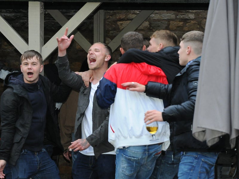 Engalnd fans watching a tense match with Scotland at the Stage in Deeping.