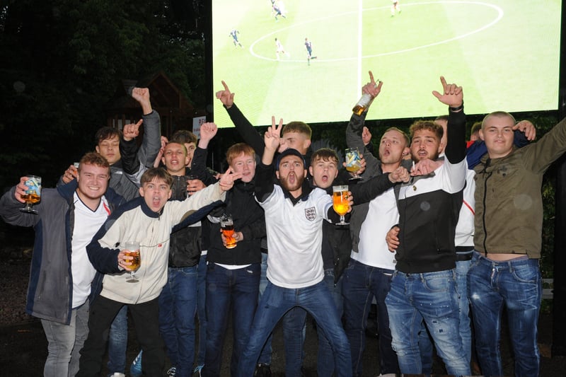 Engalnd fans watching a tense match with Scotland at the Stage in Deeping.