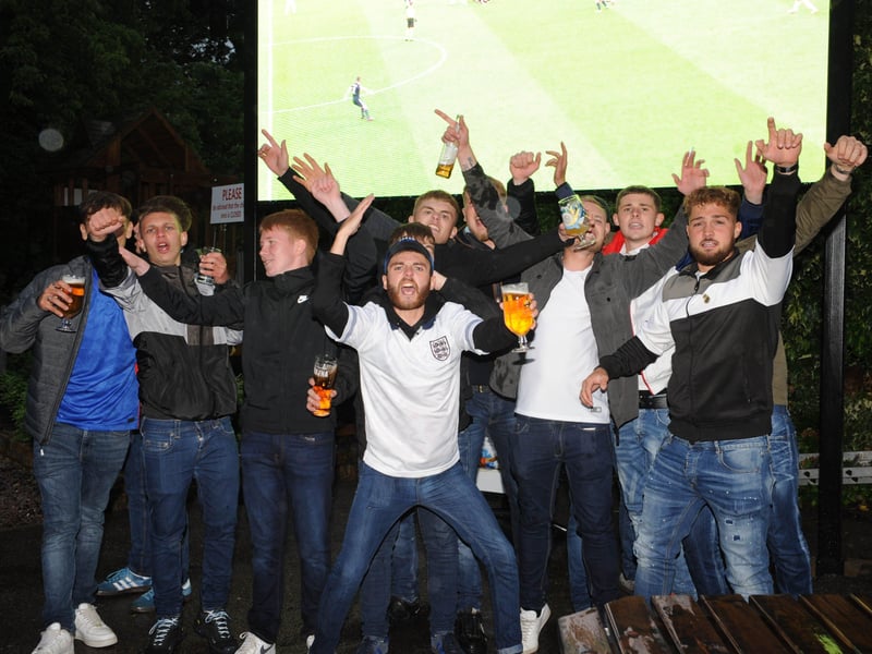Engalnd fans watching a tense match with Scotland at the Stage in Deeping.
