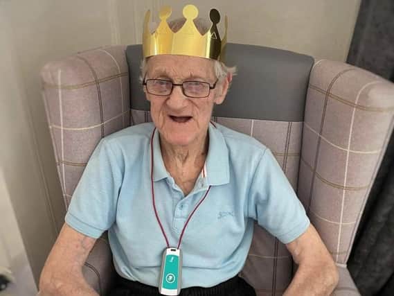 Raymond Dand is king for the day on the Queen's birthday.