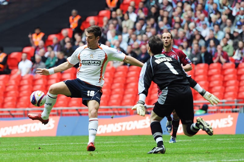 Chris Martin scores in the Johnstone's Paint Trophy at Wembley in 2009
