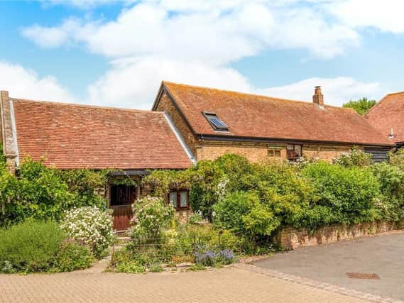 This five bedroom detached barn conversion in Gubblecote is on the market right now