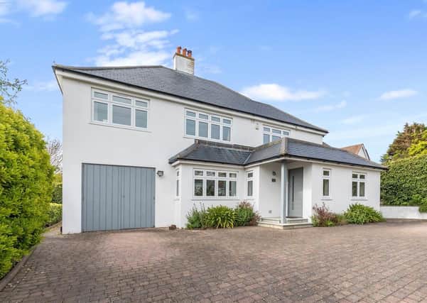 This five-bedroom detached house in Rottingdean, which features a movie room, wine store and garden annexe, is on the market for £1.9m. Photograph: Zoopla