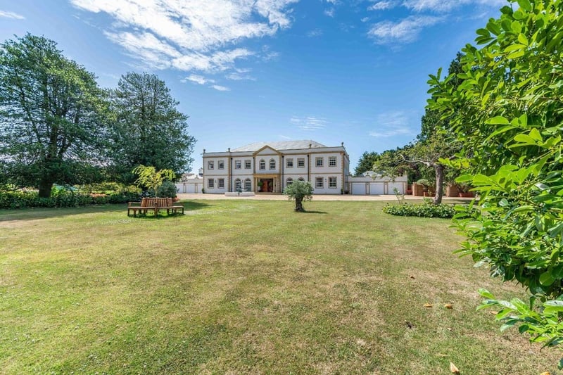The beautiful home is set in more than four acres