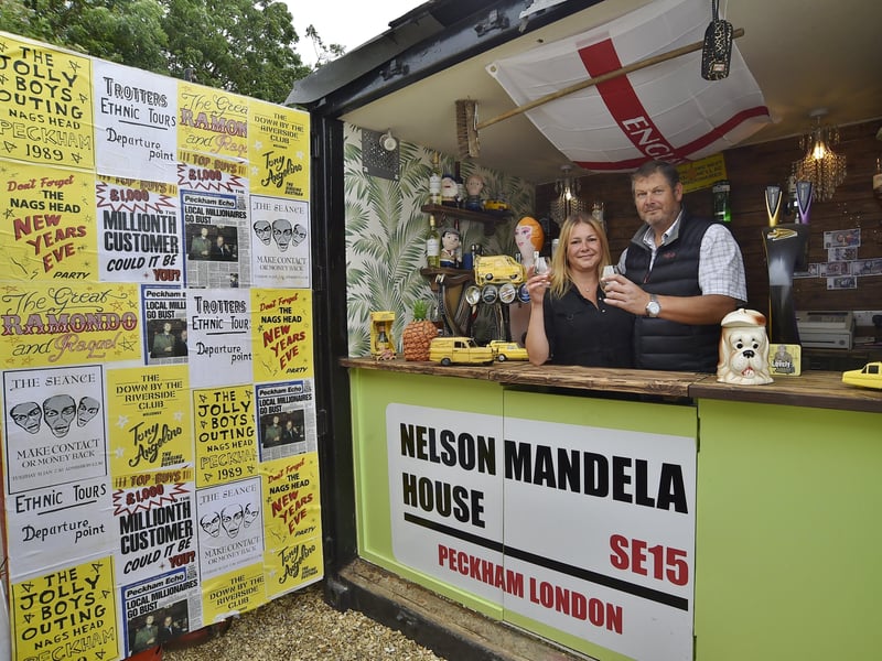 Nags Head pub, Eastrea proprietors Victoria Quinn and  Richard Owen with their Only Fools and Horses themed pub EMN-210622-154140009