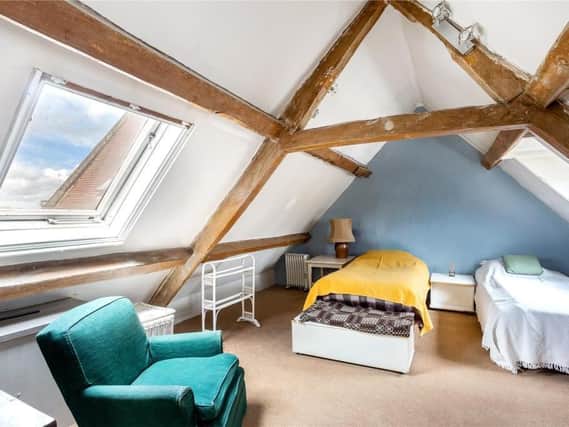 This grade II listed home -Dolphin House - with period features such exposed ceiling beams has come on the market in the village of Deddington near Banbury