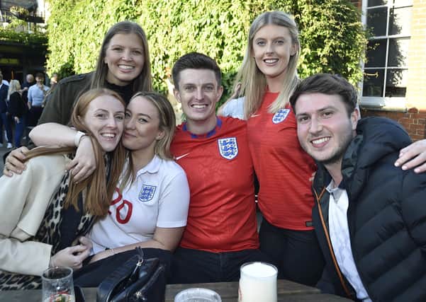 England fans watching the Czech Republic game at The Deeping Stage, Market Deeping. EMN-210622-212524009