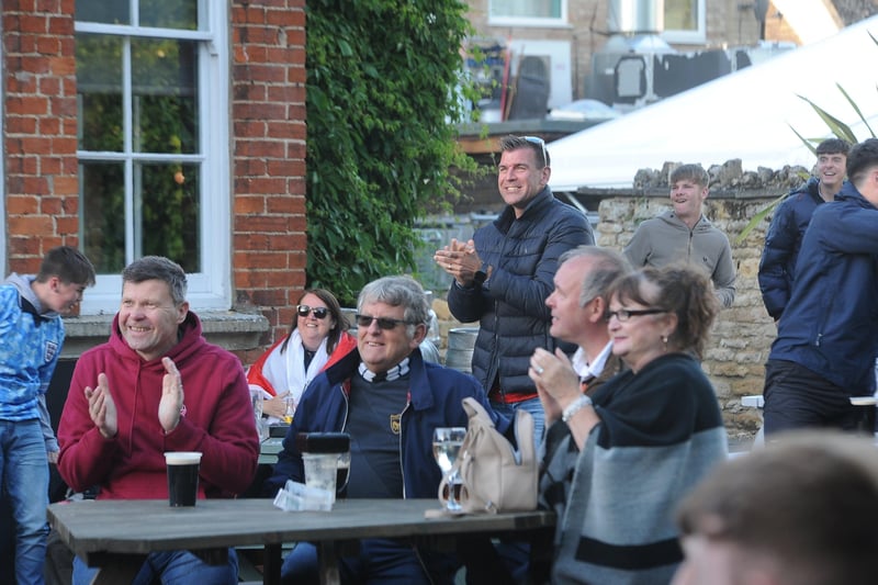England fans watching the Czech Republic game at The Deeping Stage, Market Deeping. EMN-210622-212448009
