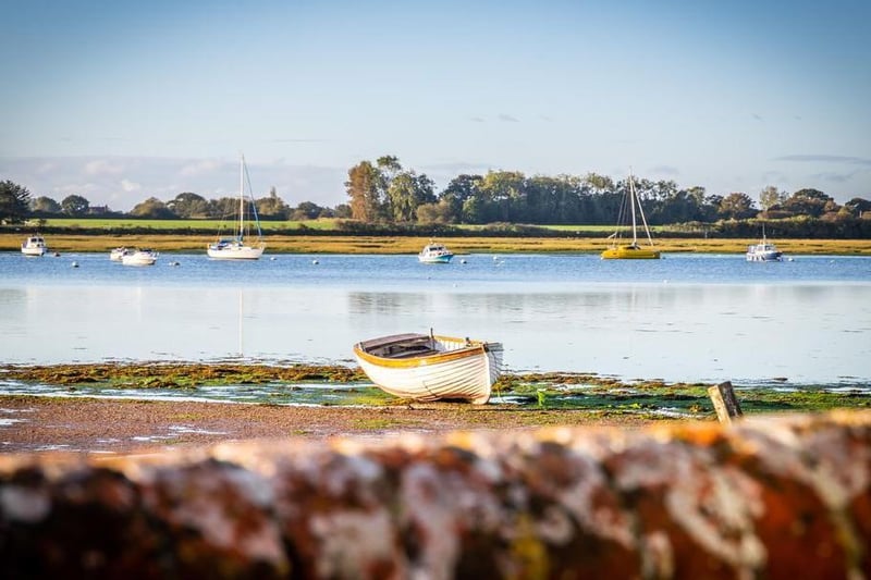 The waterfront property looks out over picturesque Chichester Harbour – and a mooring is included within the sale.