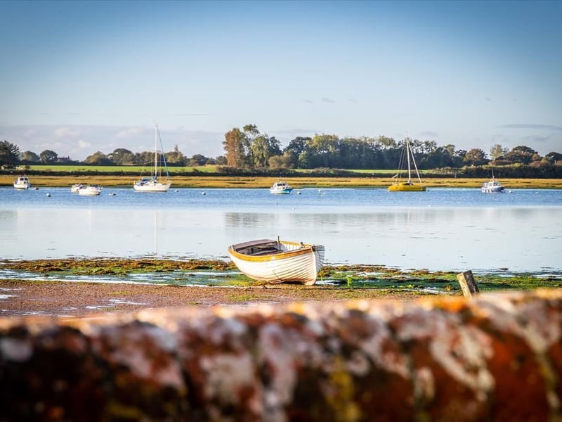 The waterfront property looks out over picturesque Chichester Harbour – and a mooring is included within the sale.
