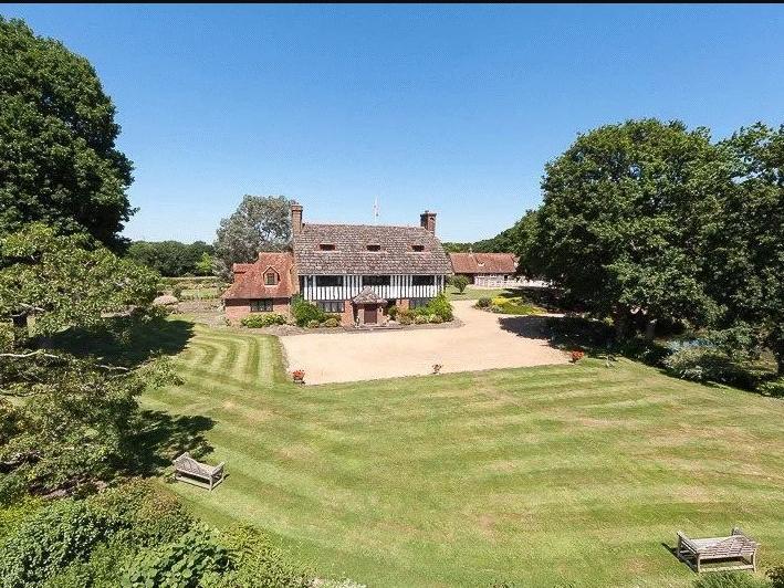 Wineham Place dates back from the early twentieth century with parts of the first and second floor believed to date back from Elizabethan times.
The nine-bed detached house in Wineham Lane, near Henfield, is an outstanding country house full of charm and character set perfectly in the centre of its own 78 acres including paddocks, woodland and lake, at the end of a long driveway.
The guide price is £3,950,000.