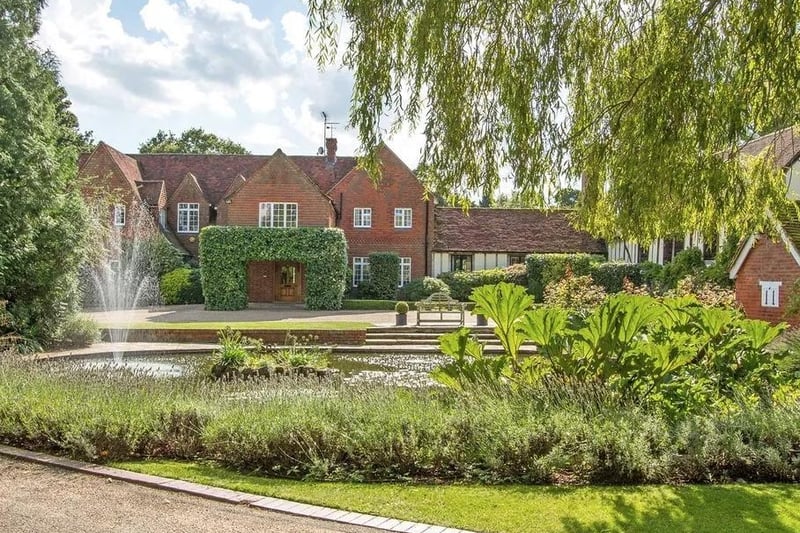 Warnham Lodge Farm is a substantial Substantial Country House lying centrally in its land with equestrian facilities.
The home in Mayes Lane, Warnham, has six bedrooms, plus two two-bed flats and extensive equestrian facilities, swimming pool, and tennis court.
Set in about 33 acres, the guide price is £3,950,000.