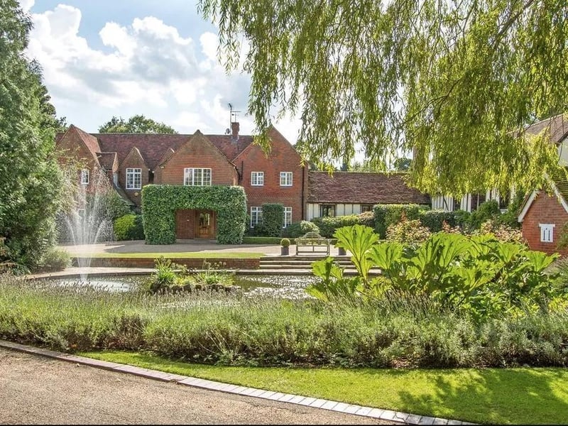 Warnham Lodge Farm is a substantial Substantial Country House lying centrally in its land with equestrian facilities.
The home in Mayes Lane, Warnham, has six bedrooms, plus two two-bed flats and extensive equestrian facilities, swimming pool, and tennis court.
Set in about 33 acres, the guide price is £3,950,000.