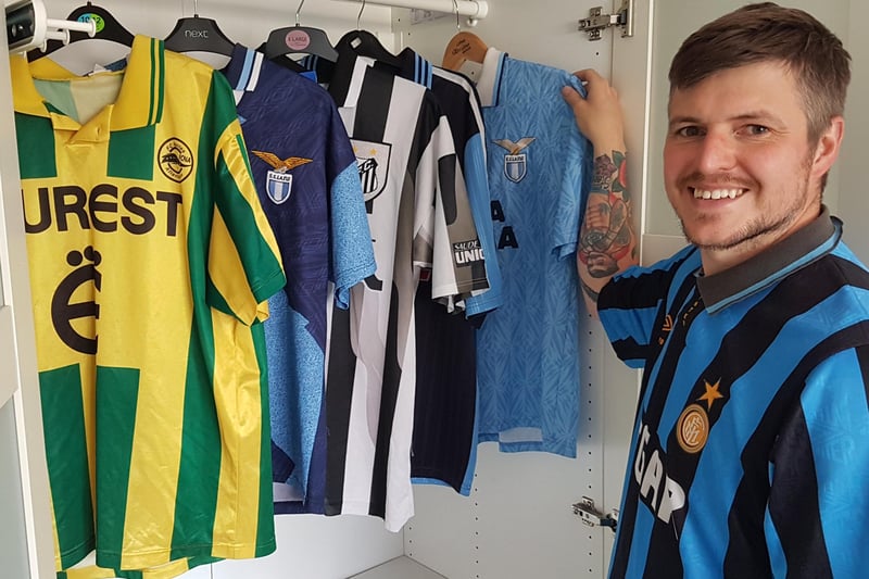 Pete with his collection of shirts.