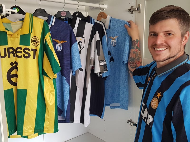 Pete with his collection of shirts.
