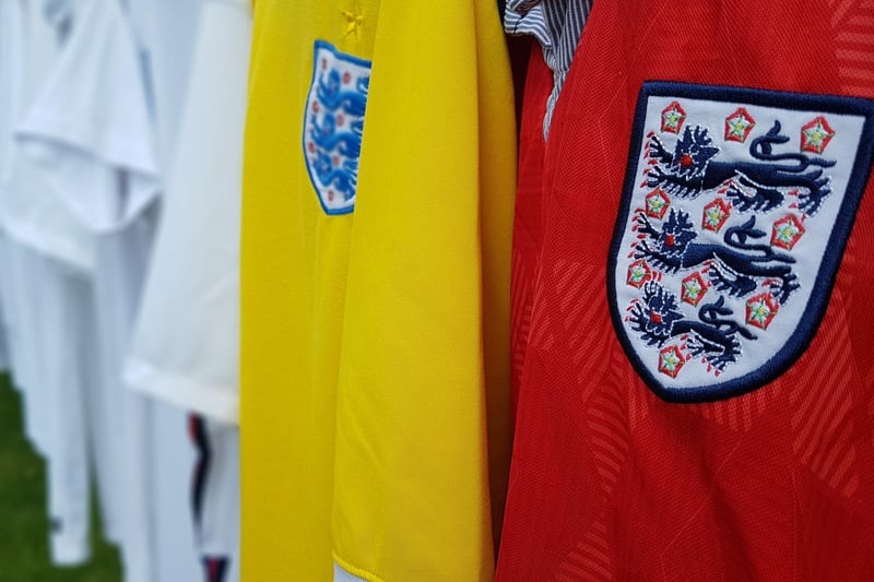 A number of Pete's England shirts.