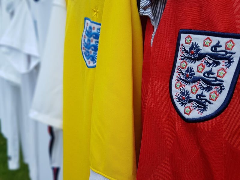 A number of Pete's England shirts.