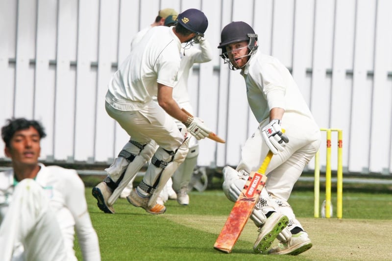 Leo Cammish and Will Adkin take a run during their century stand