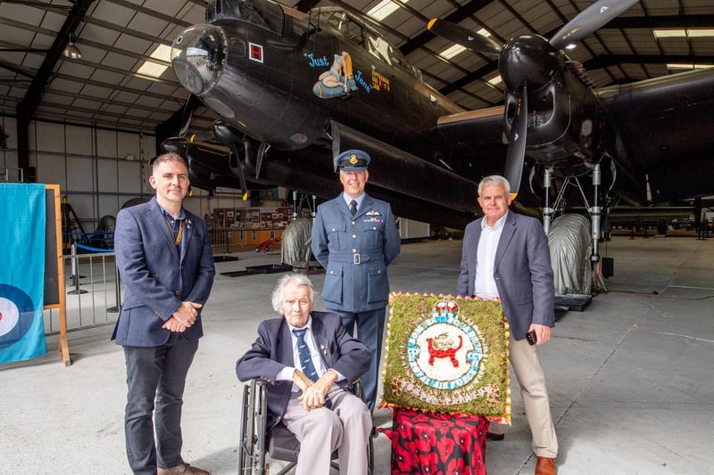 Fred Pearce in the shadow of the Lancaster with special guests from 207 Squadron at RAF Marham and Kevin Mapley at his 100th birthday.