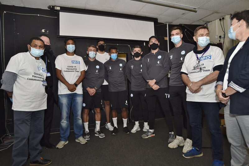 New vaccination centre opens at the Posh Ground.  Posh players waiting for their jabs EMN-210627-085649009