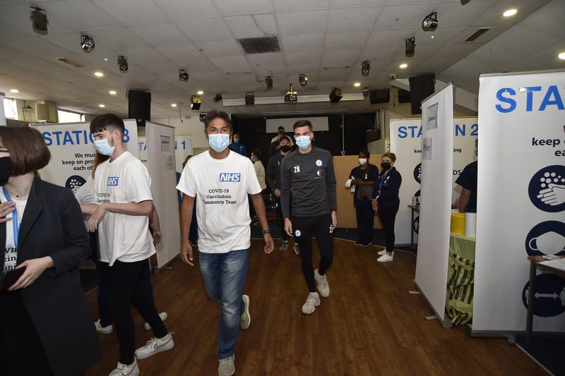 New vaccination centre opens at the Posh Ground.  Posh players waiting for their jabs EMN-210627-085700009