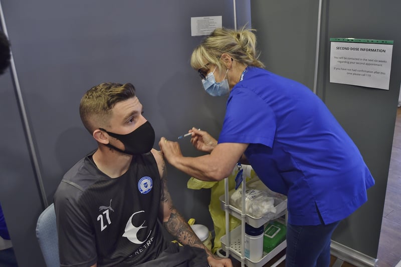 New vaccination centre opens at the Posh Ground.  Posh players getting their jabs  -   Kyle Barker EMN-210627-085743009