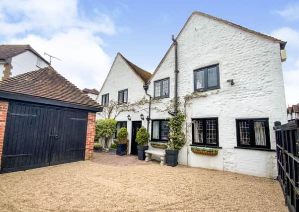 Mill Cottage, in Rottingdean, is on the market with a guide price of £900,000