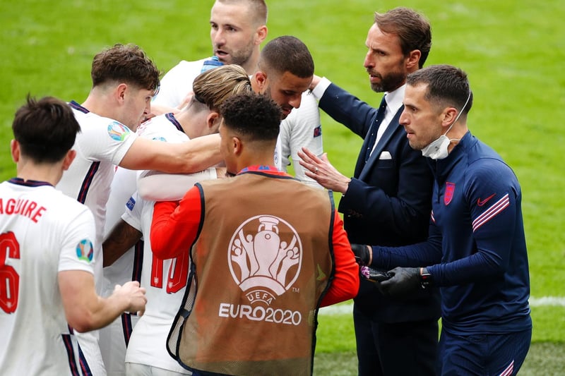 The players with Southgate after the Sterling goal