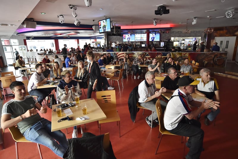 England fans at the Coyotes Bar, New Road, Peterborough EMN-210629-193908009