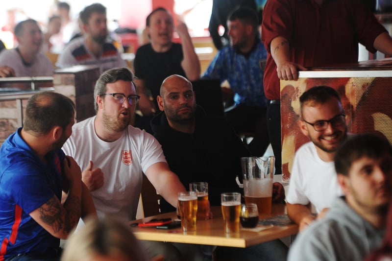 England fans at the Coyotes Bar, New Road, Peterborough EMN-210629-193919009