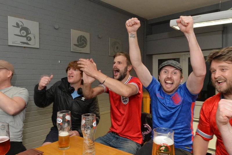 Fans celebrate at the Royalist in Market Harborough.
