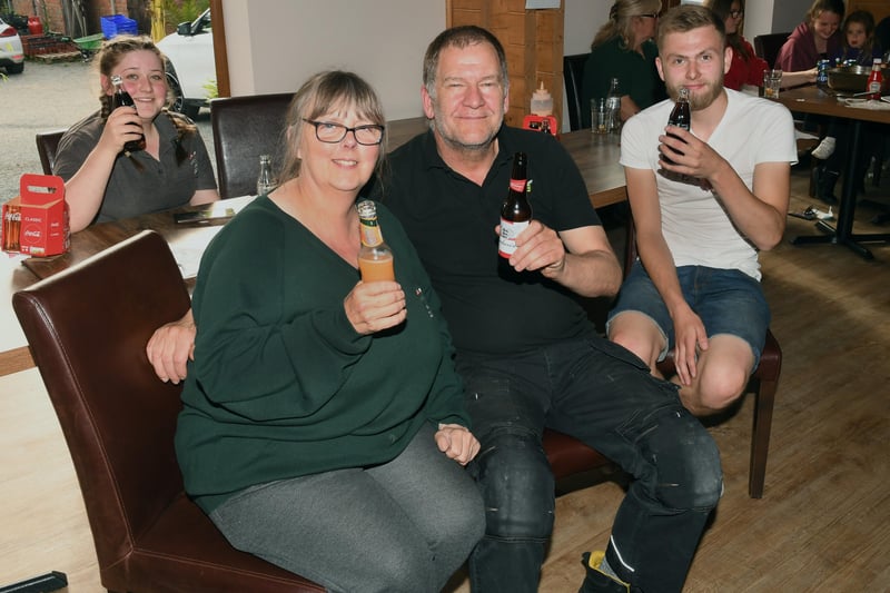 Staff stayed on at work to watch England play in Euro 2020 and were rewarded with a win against Germany. The Ploughman's Barn, Leasingham. L-R Lucy Simmons, Sharon Simmons, Paul Treliving, Ben Treliving EMN-210629-231022001