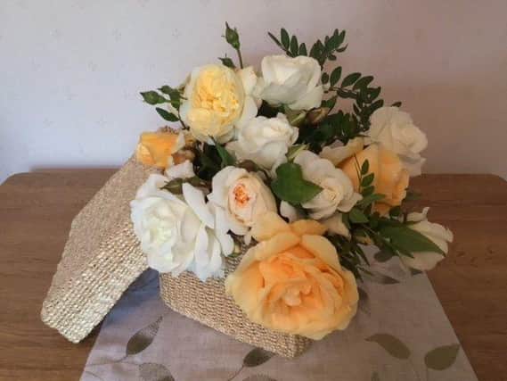 Gill Robbins came first with this entry in the floral arrangement class 'A box of roses’