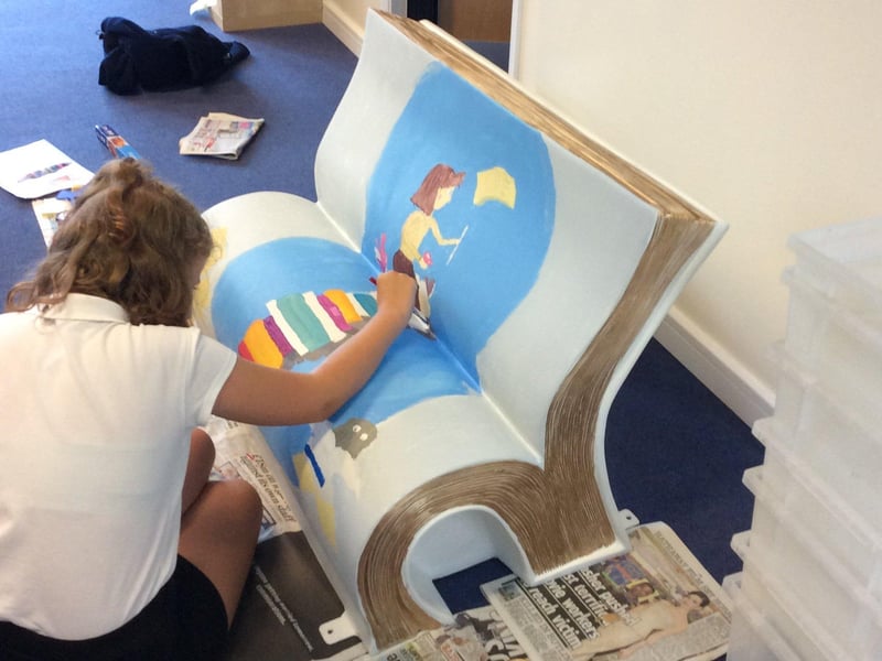 Zuzanna from Nene Valley Primary School decorating their BookBench