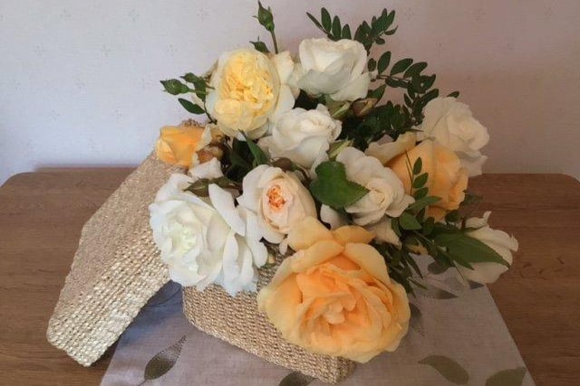 Gill Robbins came first with this entry in the floral arrangement class 'A box of roses’