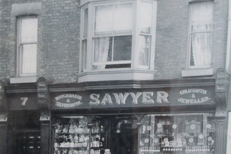 The business founder Walter Sawyer outside the shop in the 1890s.