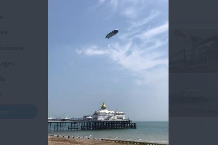 The blimp over Eastbourne pier. Photo from 
Stewart Copland. SUS-210107-130611001