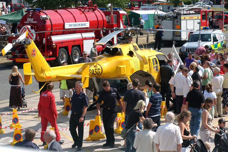 Worthing Fire Station open day in 2006, with an air ambulance helicopter landing  on Broadwater Green to promote the opening of the appeal fundraising office. Pictures: Stephen Goodger