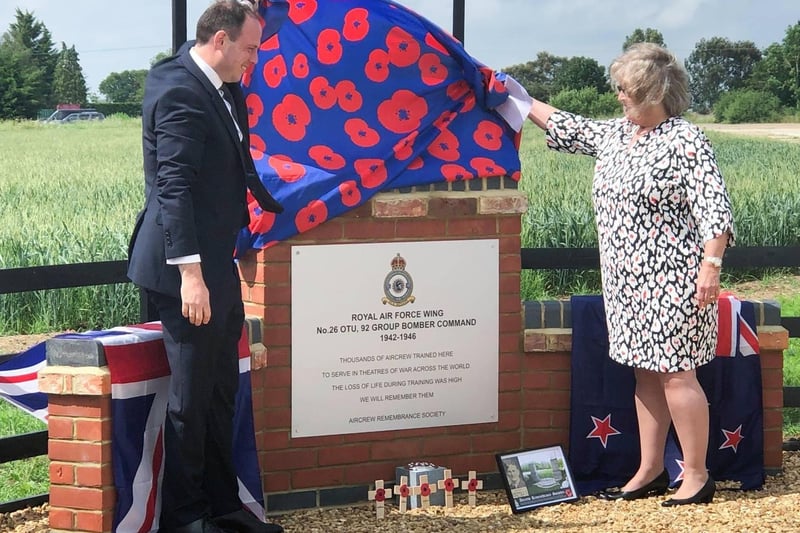 Greg Smith MP unveils the memorial assisted by Lynn Taylor-Overend, daughter of RAF Wing serviceman Eric Taylor,