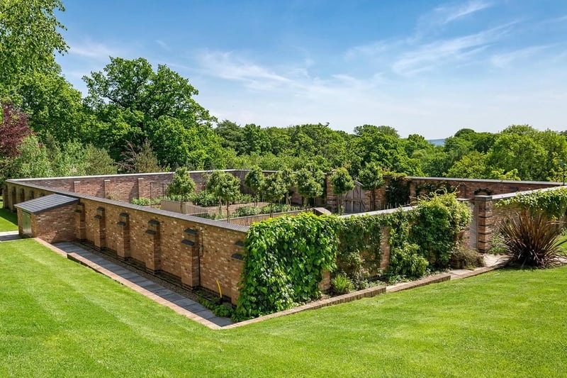 A walled garden is situated within the grounds of the property.