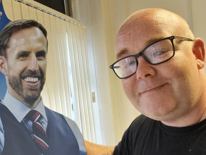Daniel Armstrong with the cardboard cutout of Gareth Southgate
