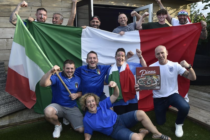 It could only be pizza for the  Imbriano family from Stanground during Italy's match with Spain. Pictures: David Lowndes