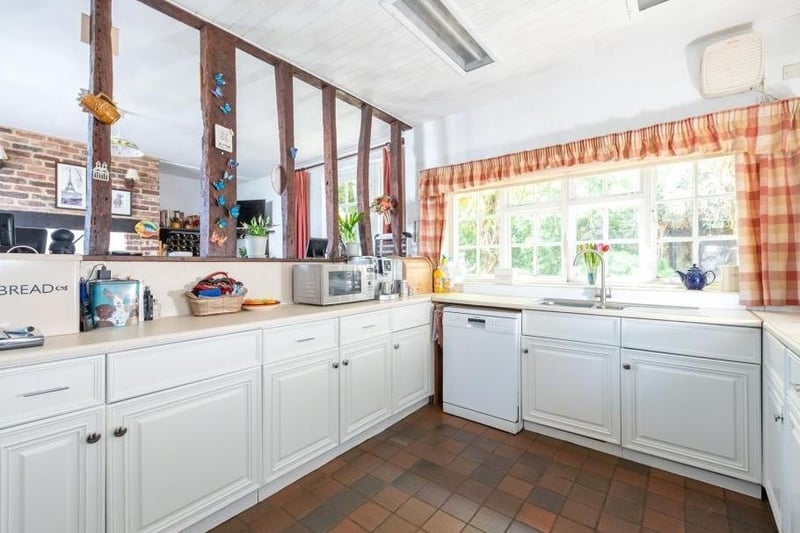 This farmhouse kitchen has cooking space for all the family