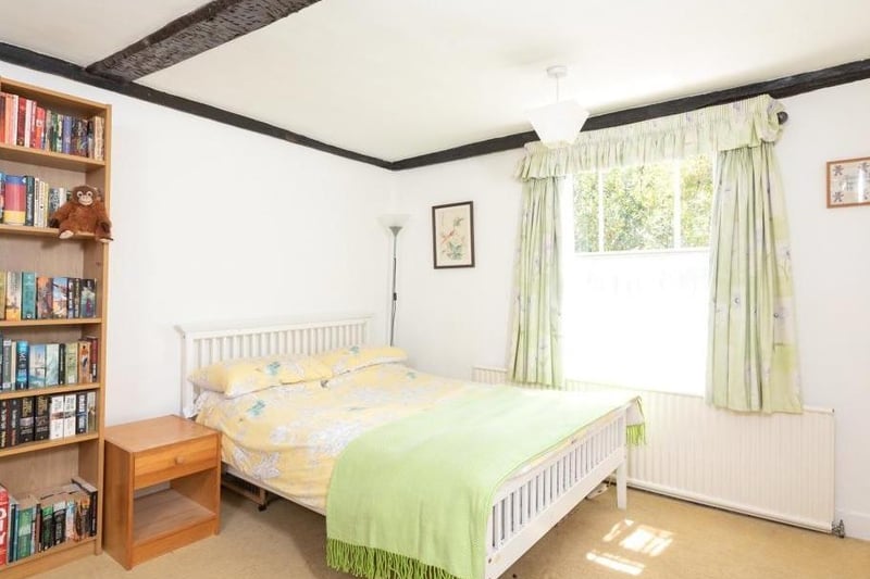 A third bedroom features ample space to be used either a single or double