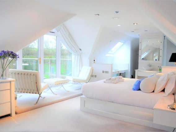 The master bedroom at the 10-bedroom home on the market near Shutford, Banbury (Image from Rightmove)