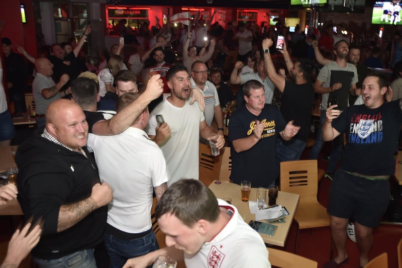 England fans watching the Euro 20 semi-final at the Coyotes Bar and Grill at New Road, Peterborough EMN-210707-230705009