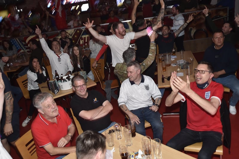 England fans watching the Euro 20 semi-final at the Coyotes Bar and Grill at New Road, Peterborough EMN-210707-230800009